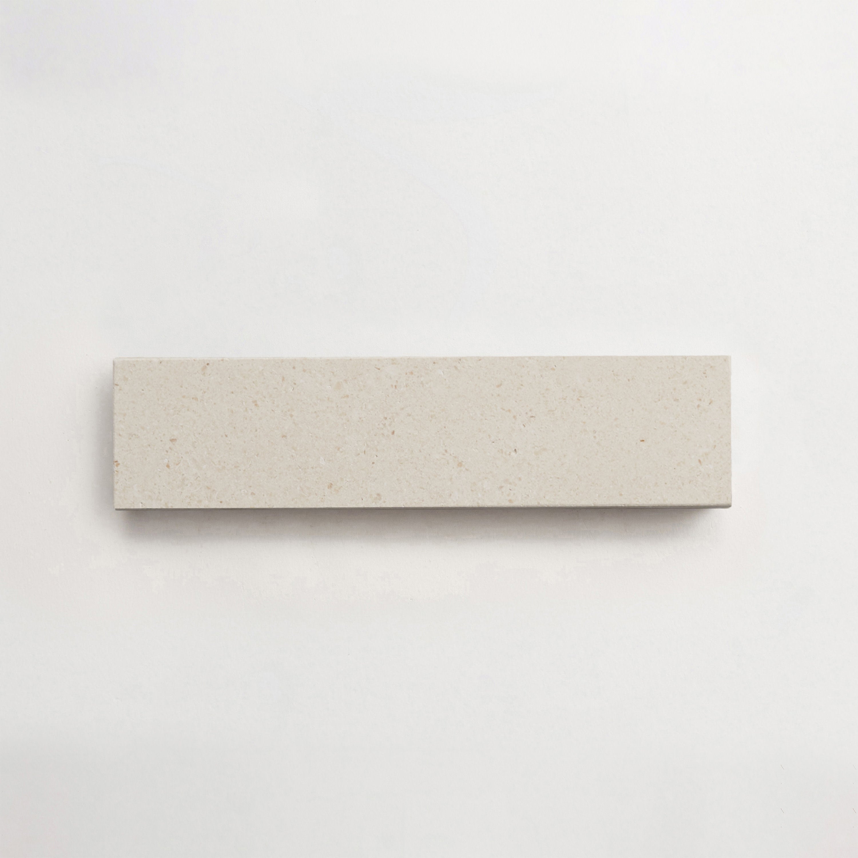 cle-terre-lapidary-white-limestone-2x8-cigar-singles-3000x3000-300dpi.jpg