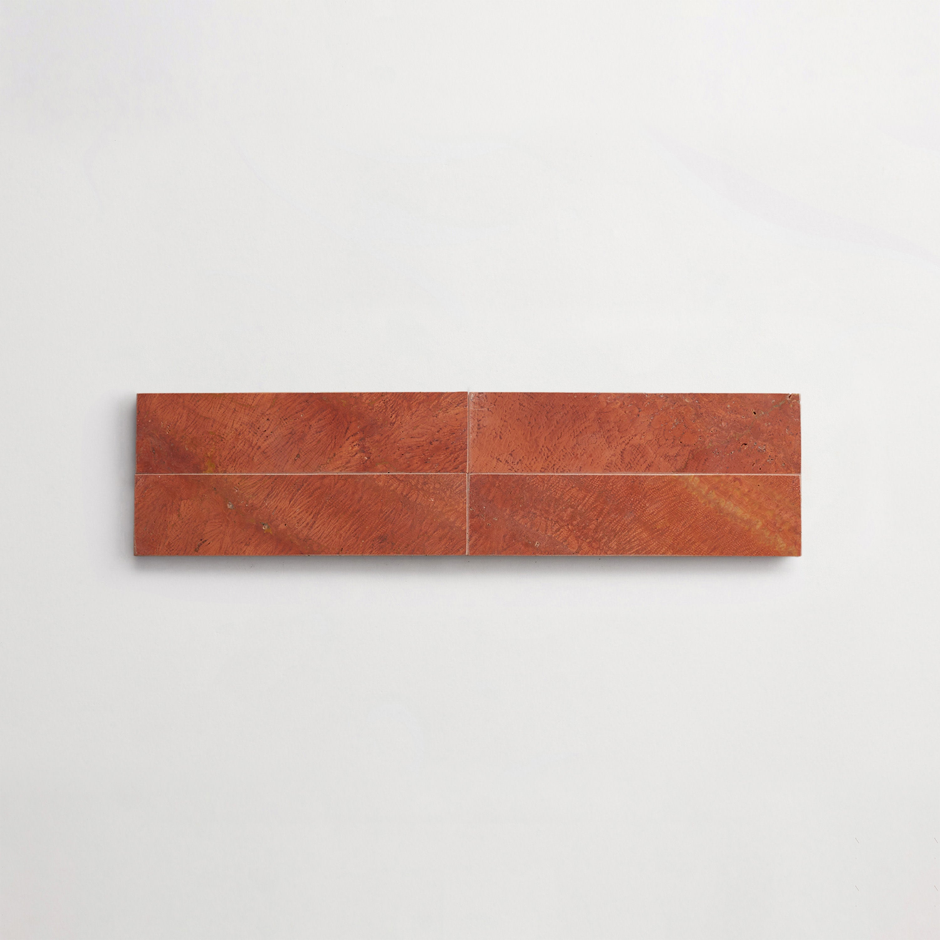 LP0139-cle-terre-lapidary-red-travertine-2x8-cigar-4up-3000x3000.jpg