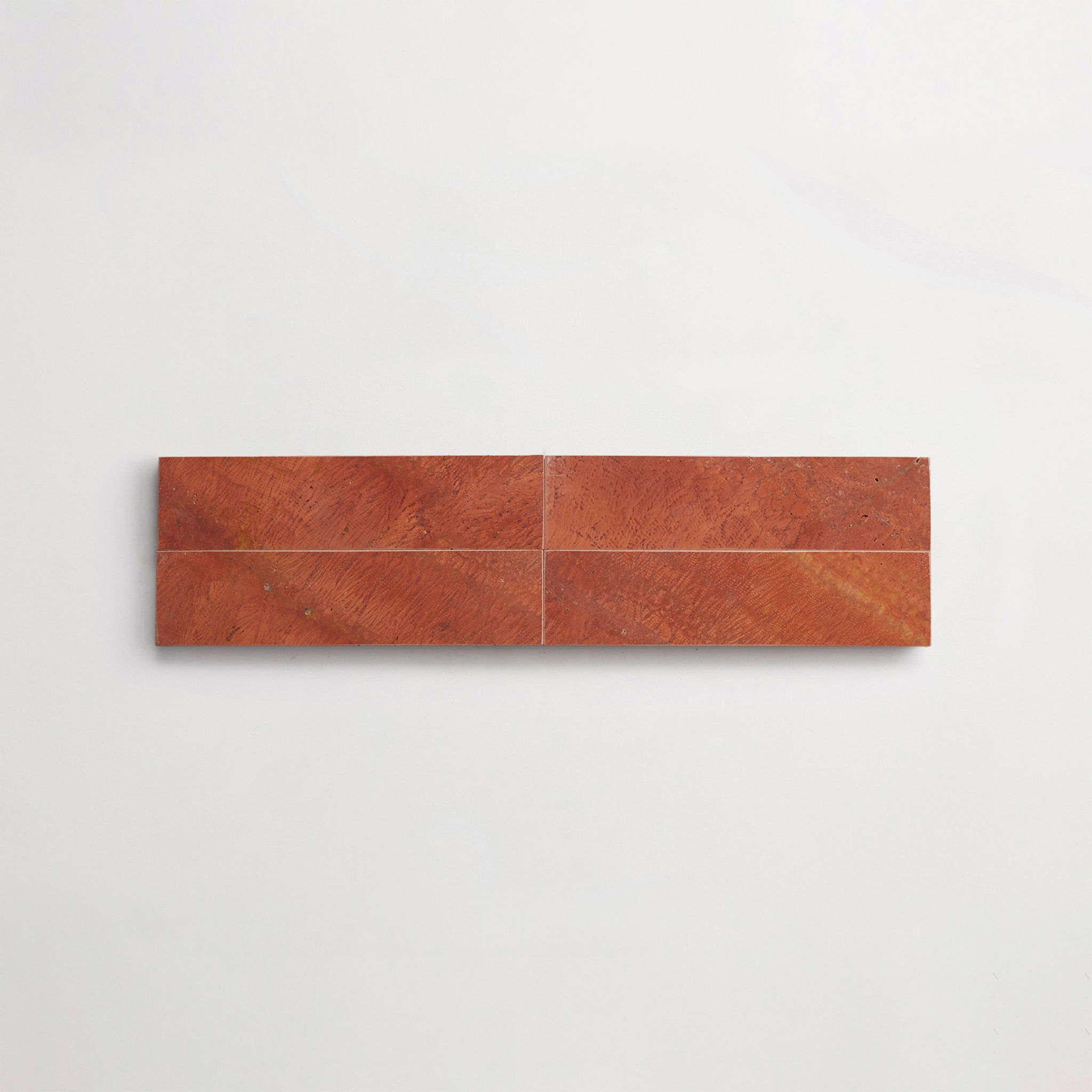 LP0139-cle-terre-lapidary-red-travertine-2x8-cigar-4up-3000x3000.jpg