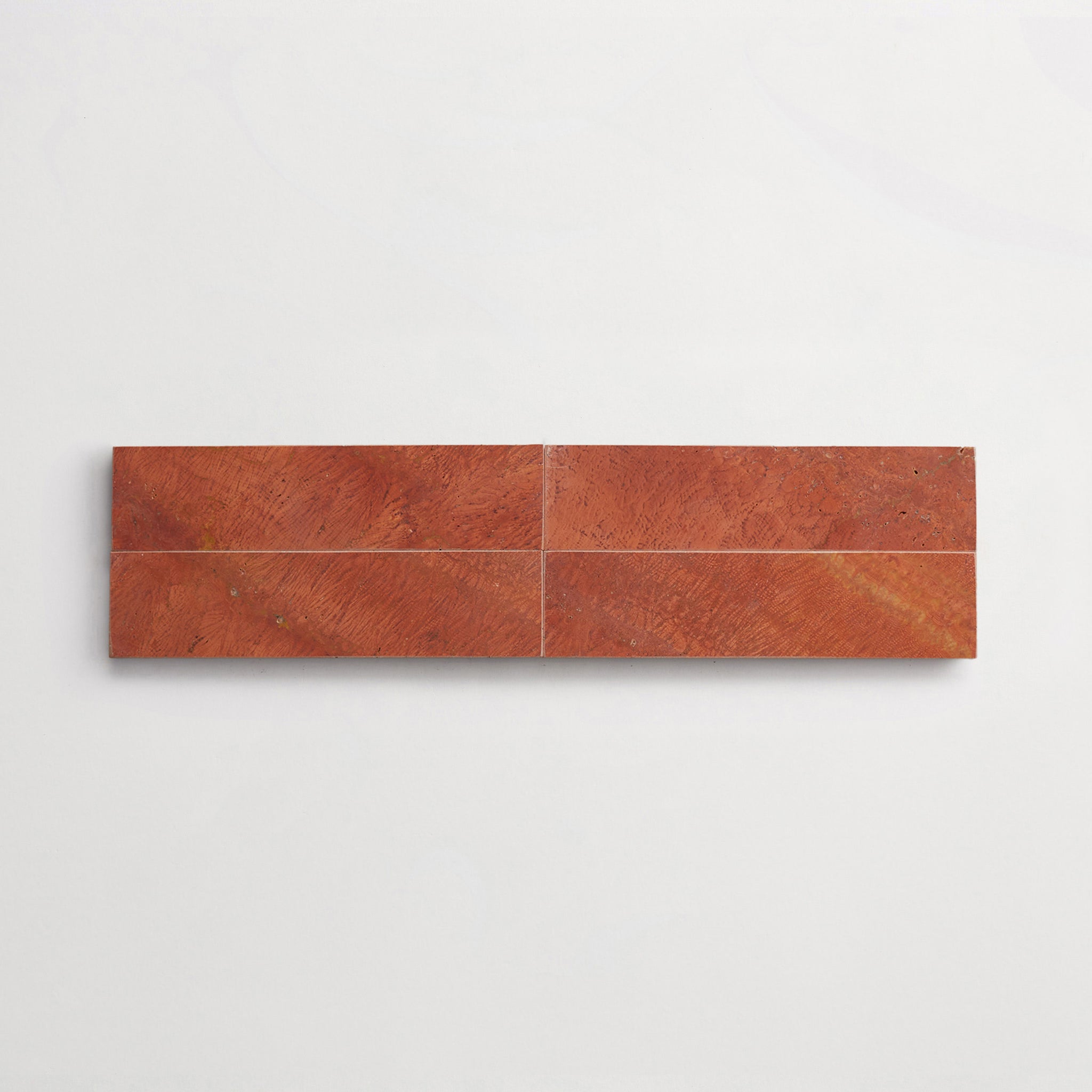 LP0146-cle-terre-lapidary-red-travertine-3x12-blade-4up-3000x3000.jpg