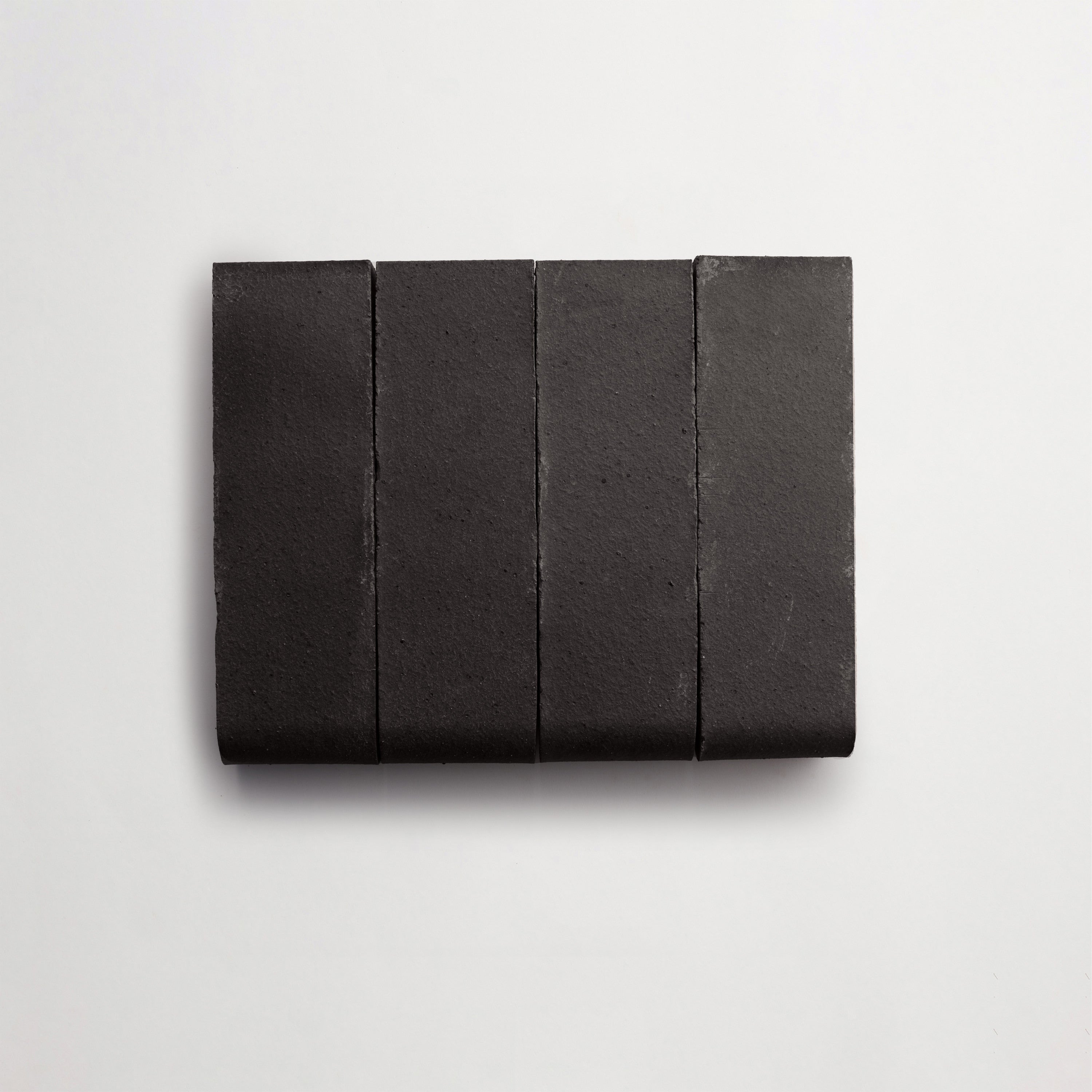 FF10098-outer-cle-brick-bullnose-scorched-earth-long-4up-3000x3000-300dpi.jpg